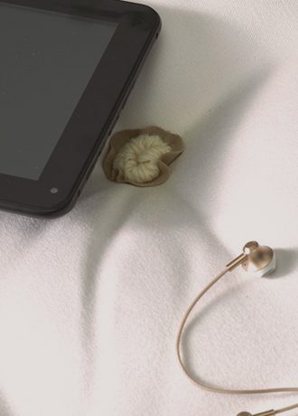 Rose Gold Headphones and Kindle on Vispring Beds